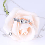 4.50ct Emerald & Round Cut Moissanite Necklace, Elegant Rubover Setting, 10Kt White Gold
