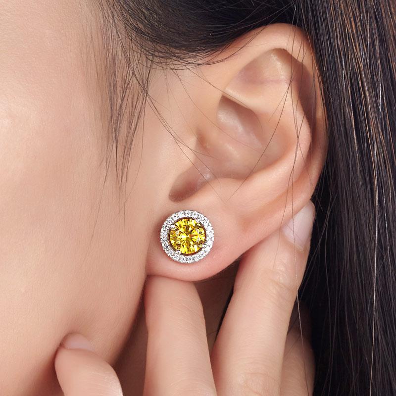 Yellow diamond halo stud earrings top