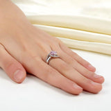 1.25ct Vivid Pink, Round Brilliant Cut Diamond Twist Engagement Ring